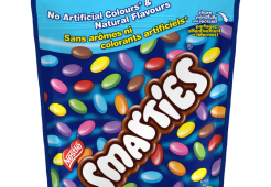Chocolat au lait enrobé de bonbons SMARTIES, sachet refermable, 203 grammes.